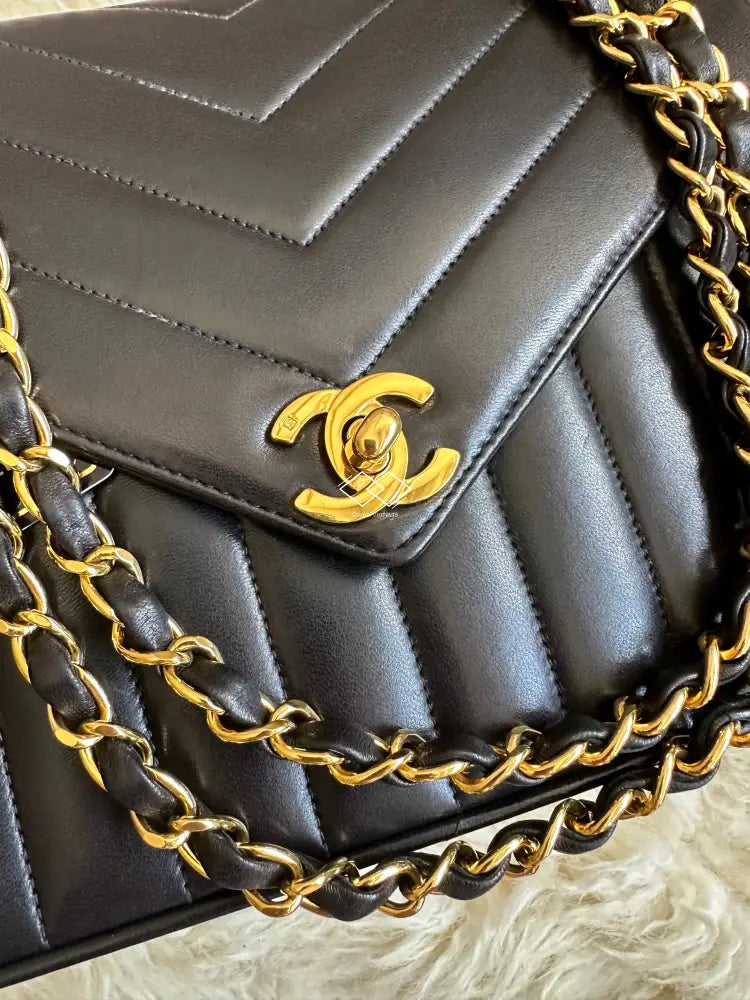 CHANEL Lambskin Chevron Stitched Envelope Flap Bag Black 1201352